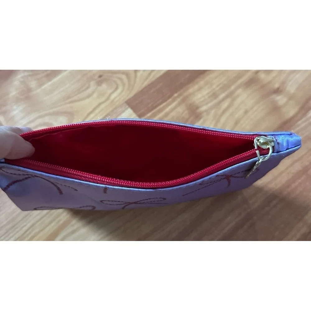 Ipsy lavender cosmetic bag from the December 2025 Glam Bag collection,